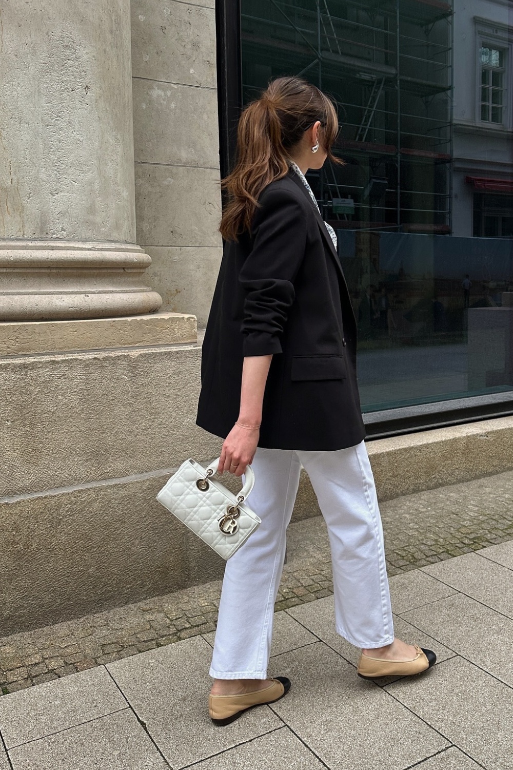 Black Coat and White Jeans