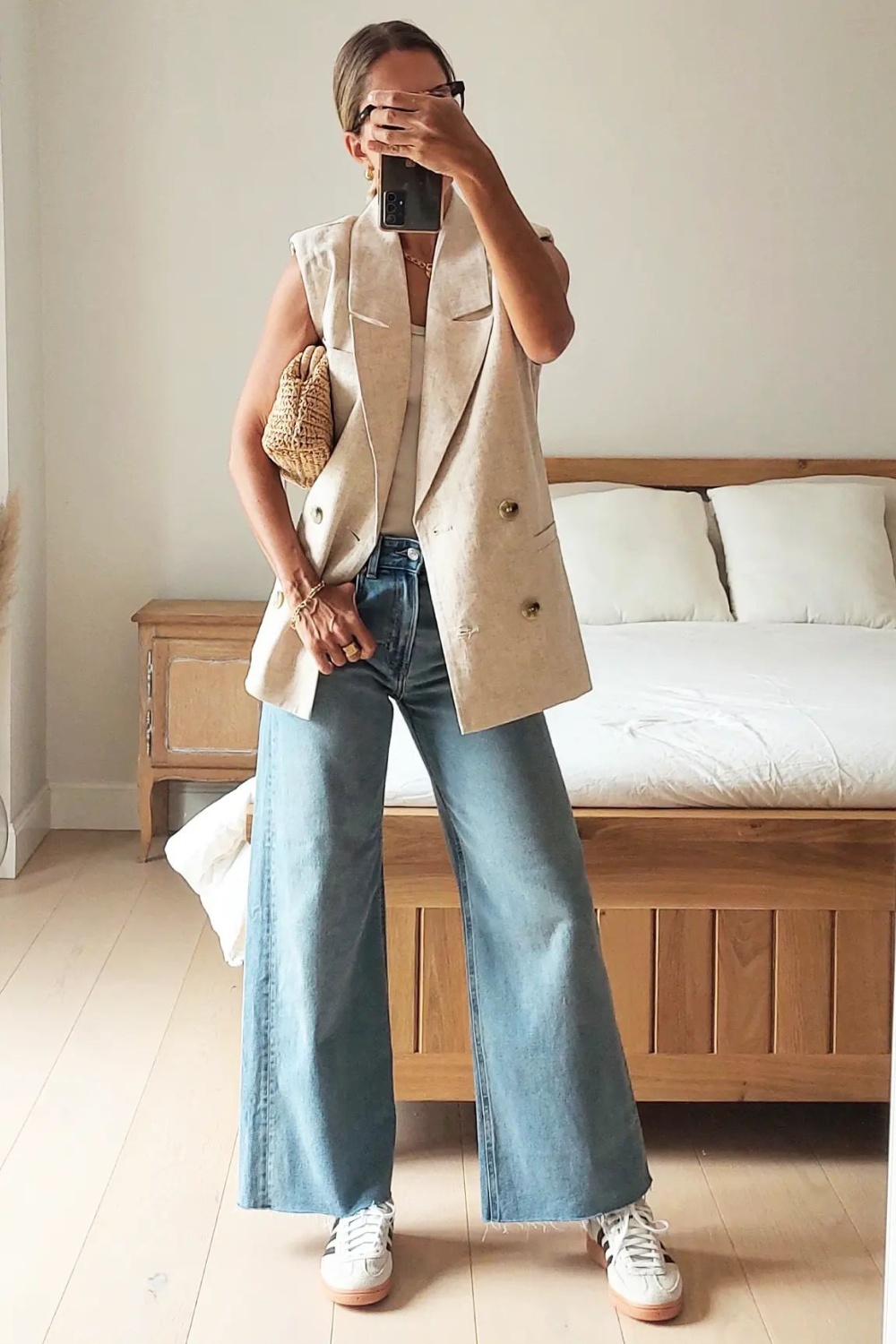 Sleek and Chic: Vest and Wide-Leg Jeans