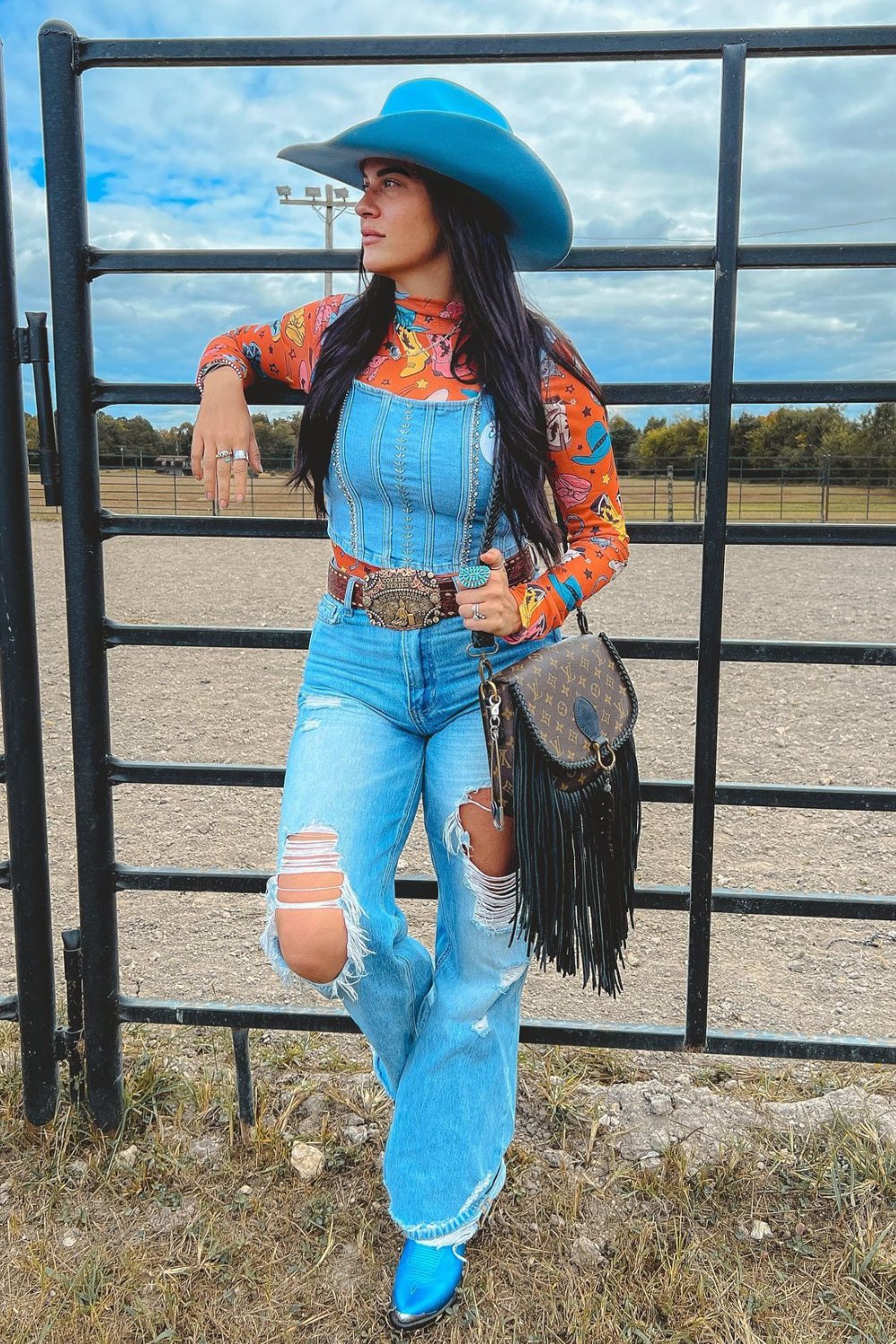 Orange Top & Distressed Jeans