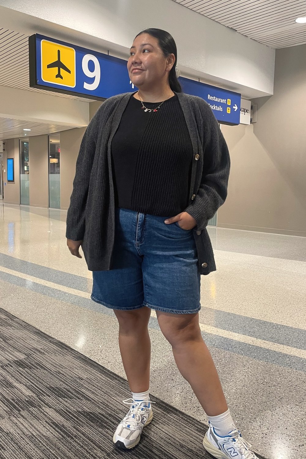 Ribbed Sweater, Denim Shorts, and Sneakers