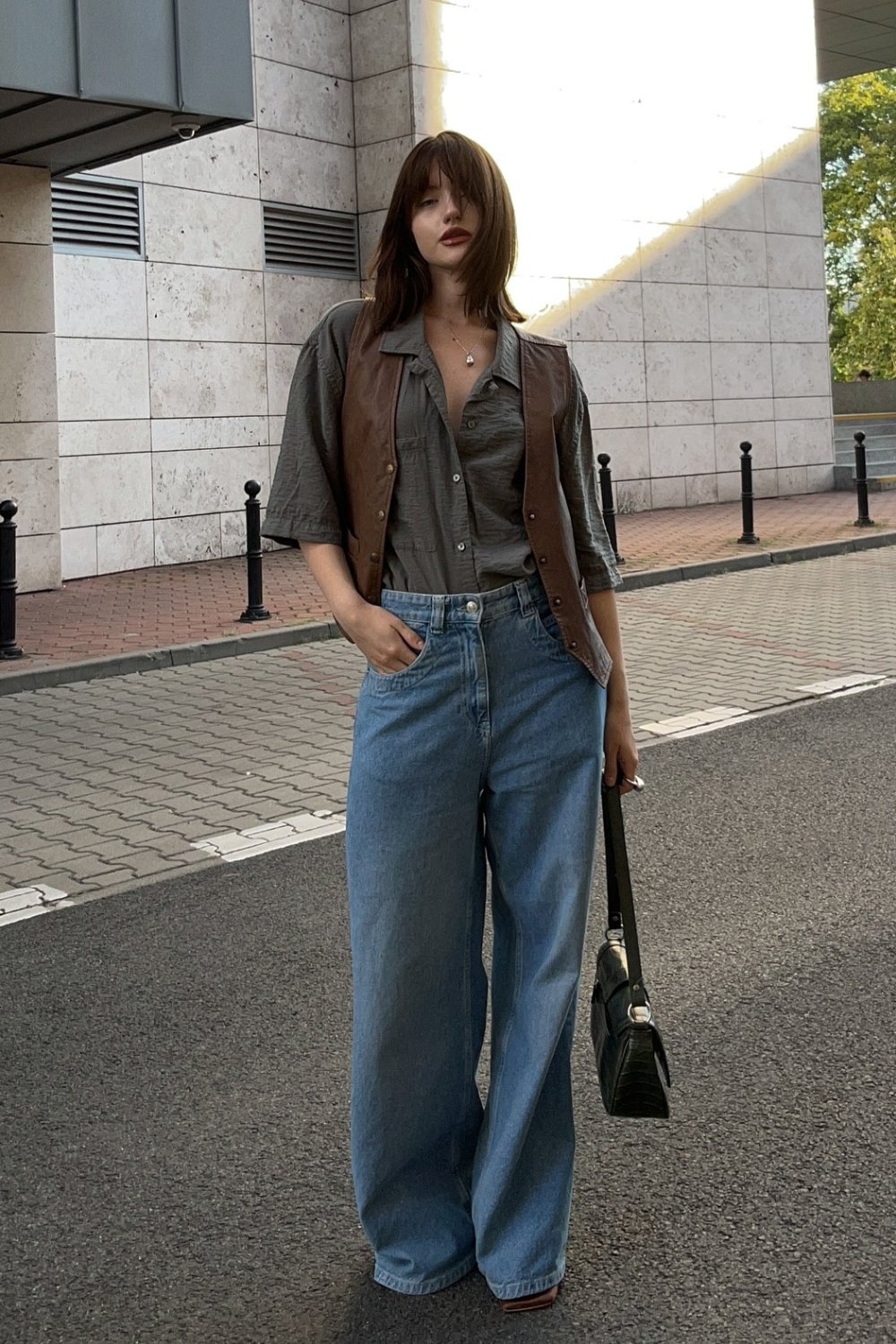 Leather Vest and Wide-Leg Jeans