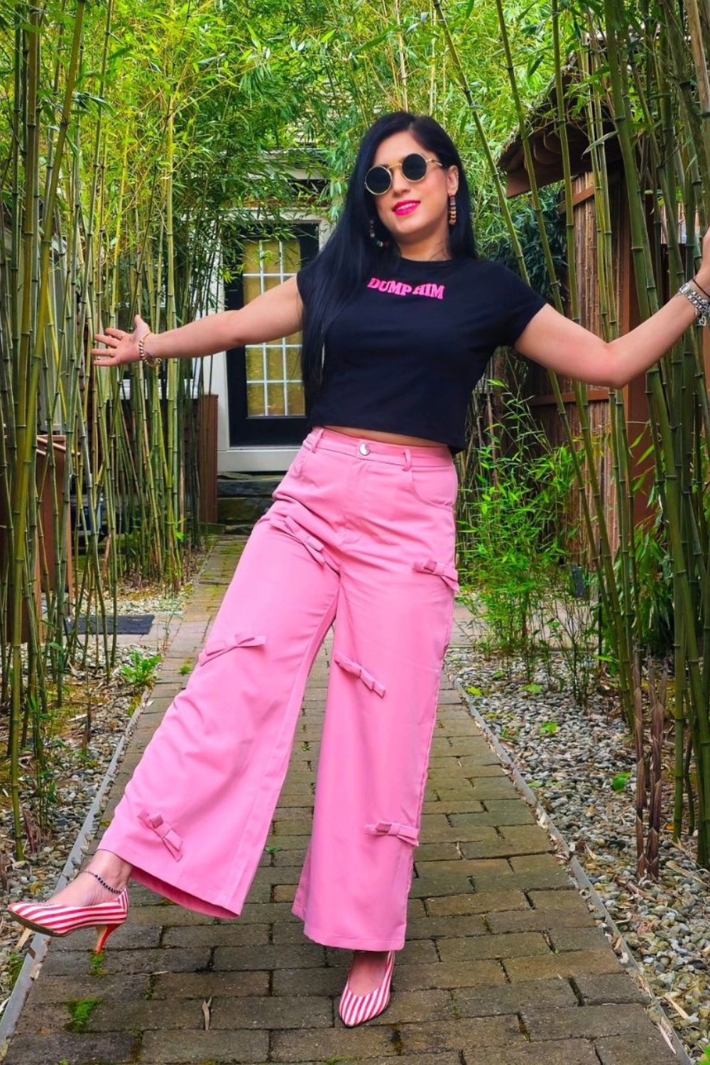 Edgy Contrast: Black Crop Top and Pink Wide-Leg Pants