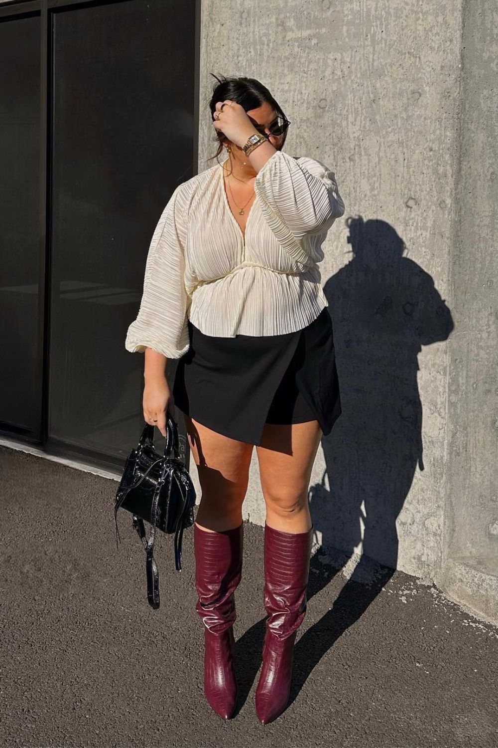 White Blouse and Black Mini Skirt with Knee-High Boots