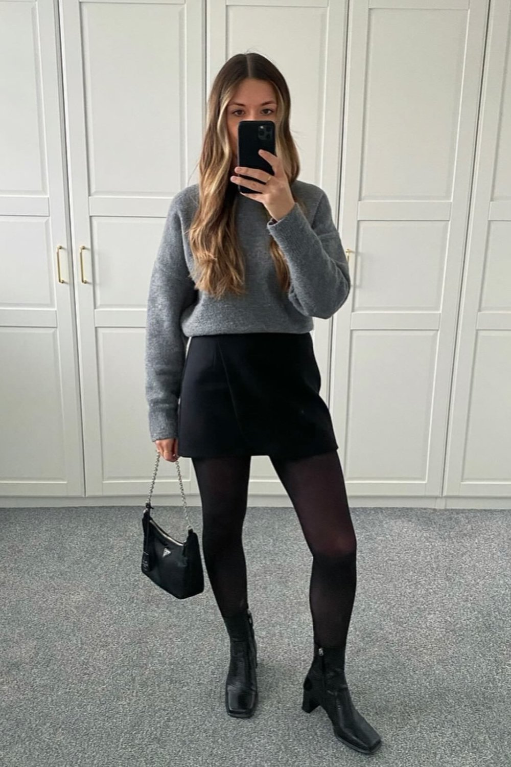 Gray Sweater, Black Mini Skirt & Sheer Tights