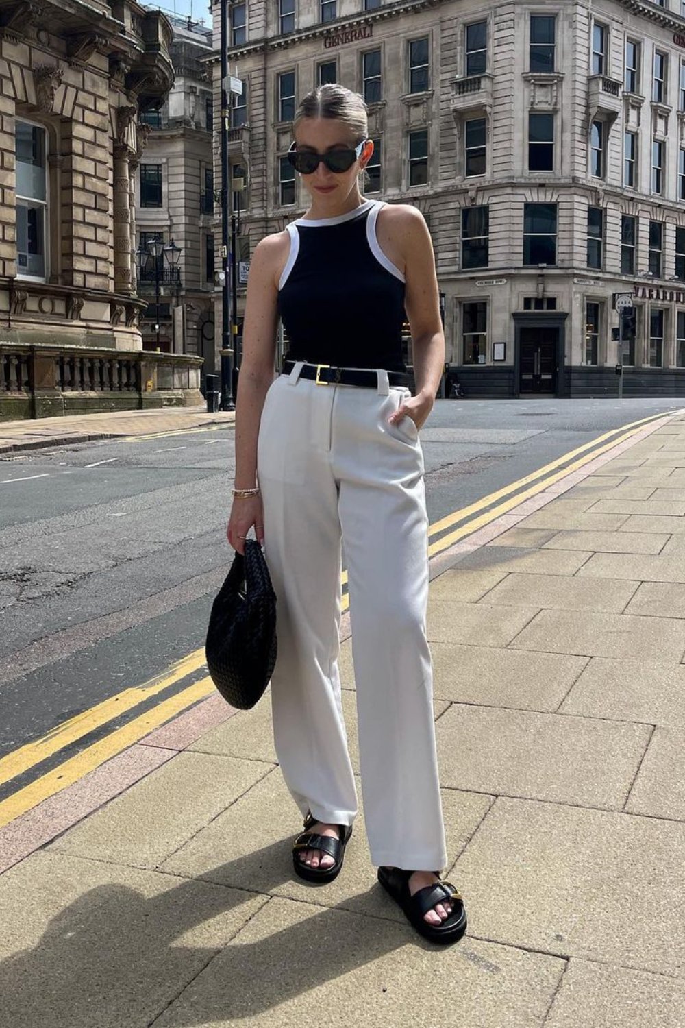 Black Sleeveless Bodysuit & White Trousers