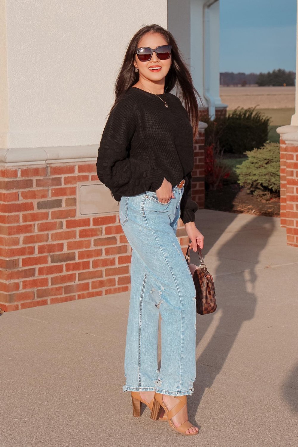 Cozy Black Sweater with Light Wash Mom Jeans