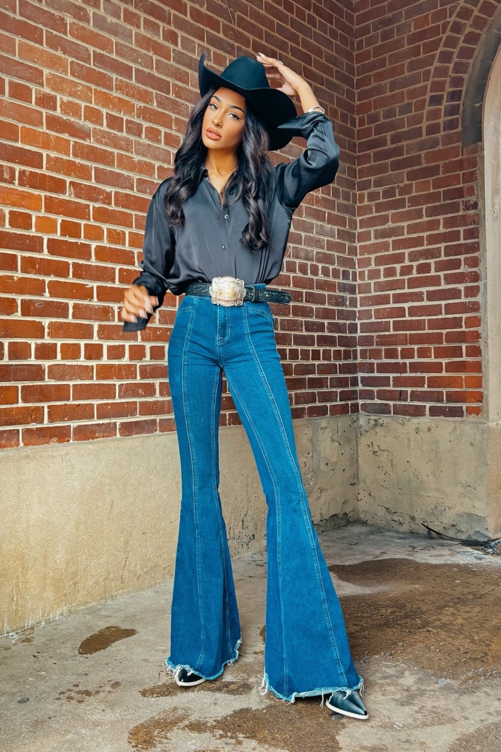 Black Blouse and Flared Jeans