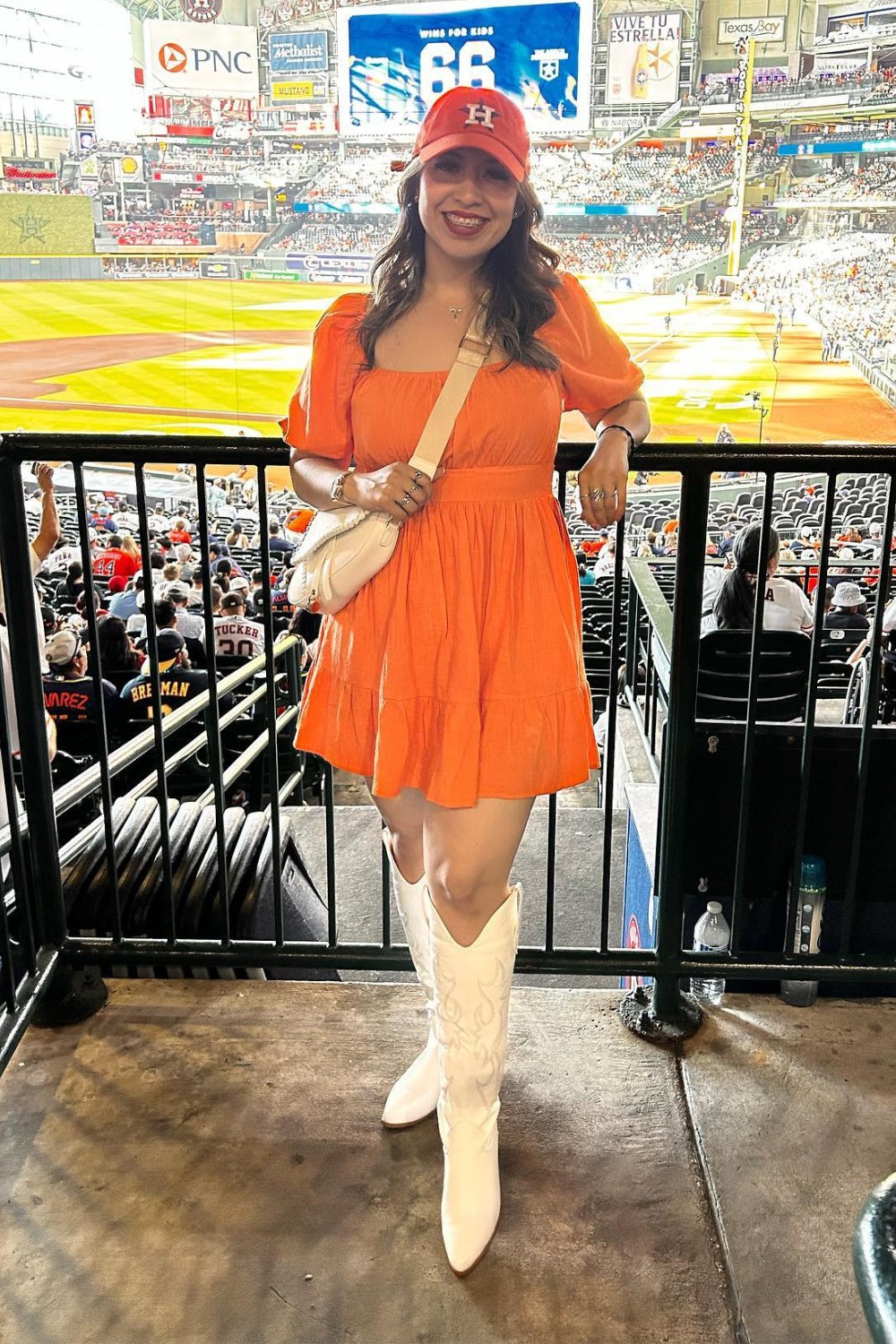 Orange Puff Sleeve Dress, Baseball Cap & Cowboy Boots