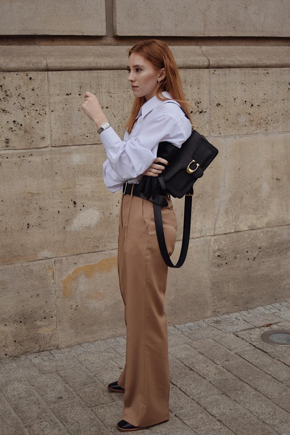 White button-up with beige trousers