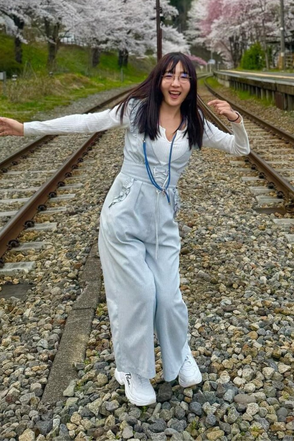 White Sneakers and Wide-Leg Jumpsuit