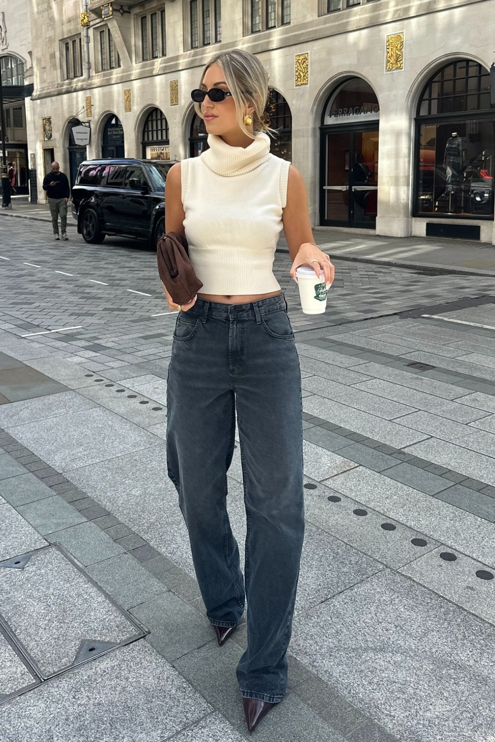 Cream Sleeveless Turtleneck Crop Top and High-Waisted Jeans