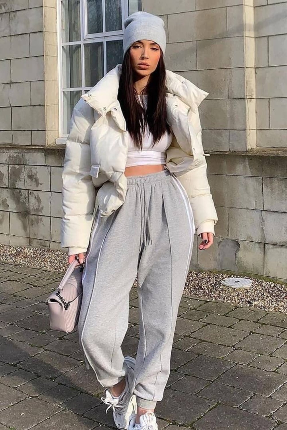 White Puffer Jacket and Light Gray Sweatpants