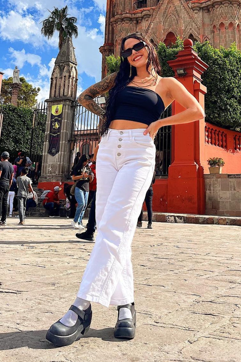 Black Crop Top & High-Waisted White Jeans