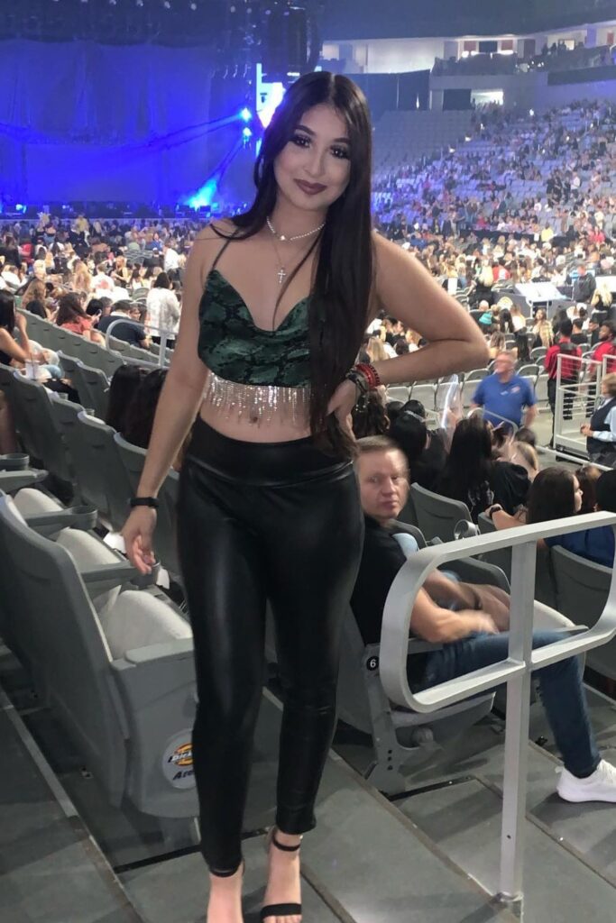 Dark Velvet Crop Top, Black Pants, and Silver Necklace