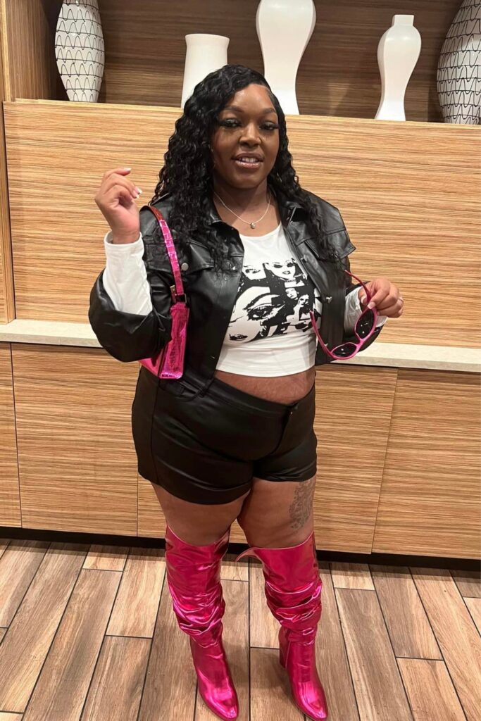 White Crop Top, Black Leather Jacket, Shorts, and Hot Pink Boots