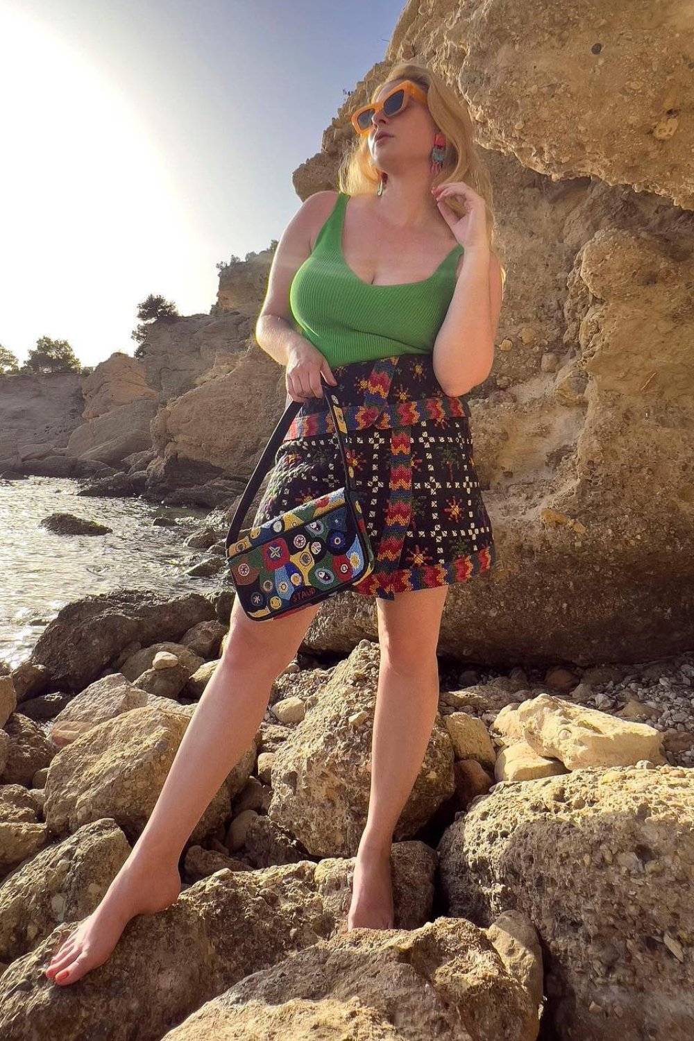 Green Tank and Patterned Mini Skirt