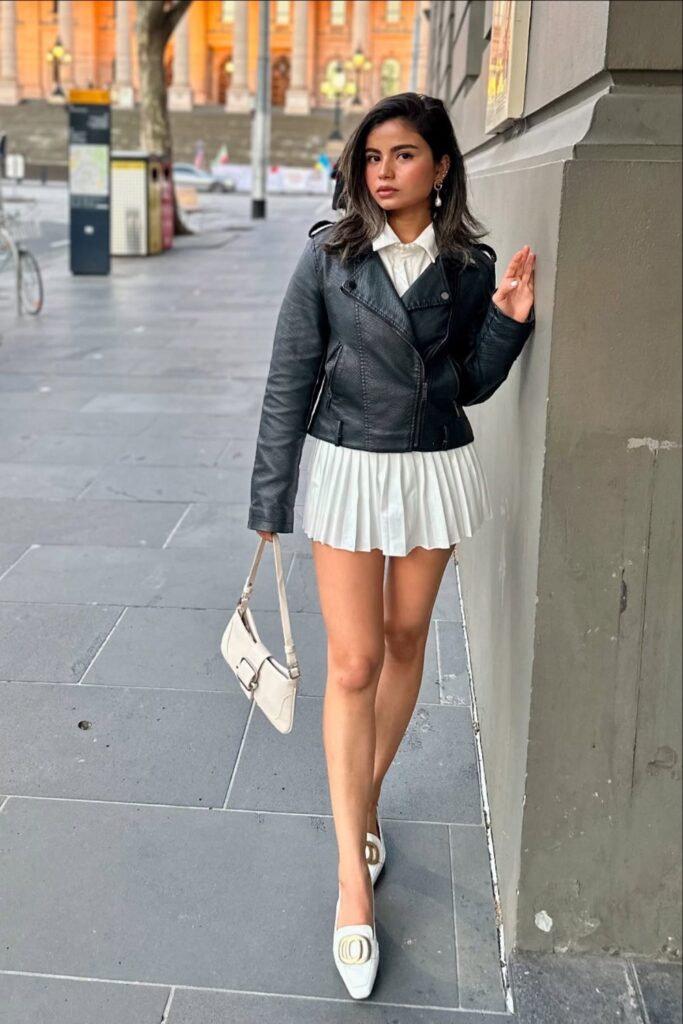 Moto Jacket, Collared Shirt, Pleated Skirt, and Loafers