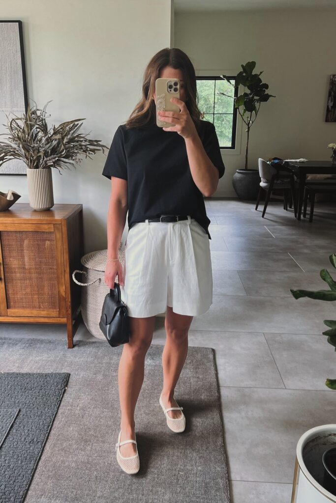 Black Tee and White Bermudas