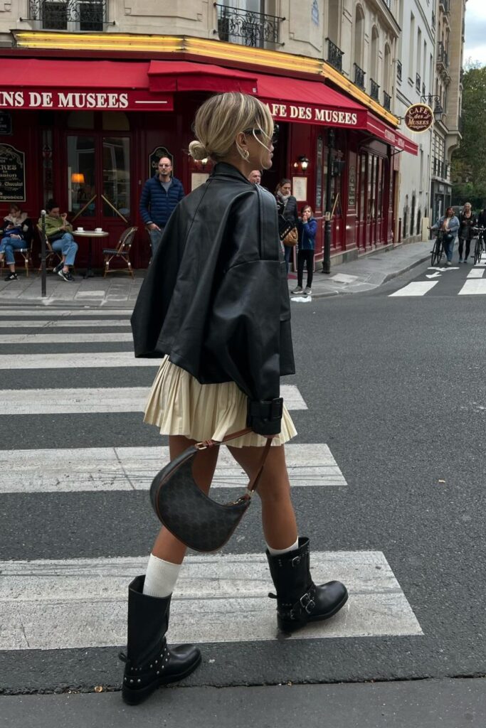 Leather Jacket and Pleated Skirt Ensemble