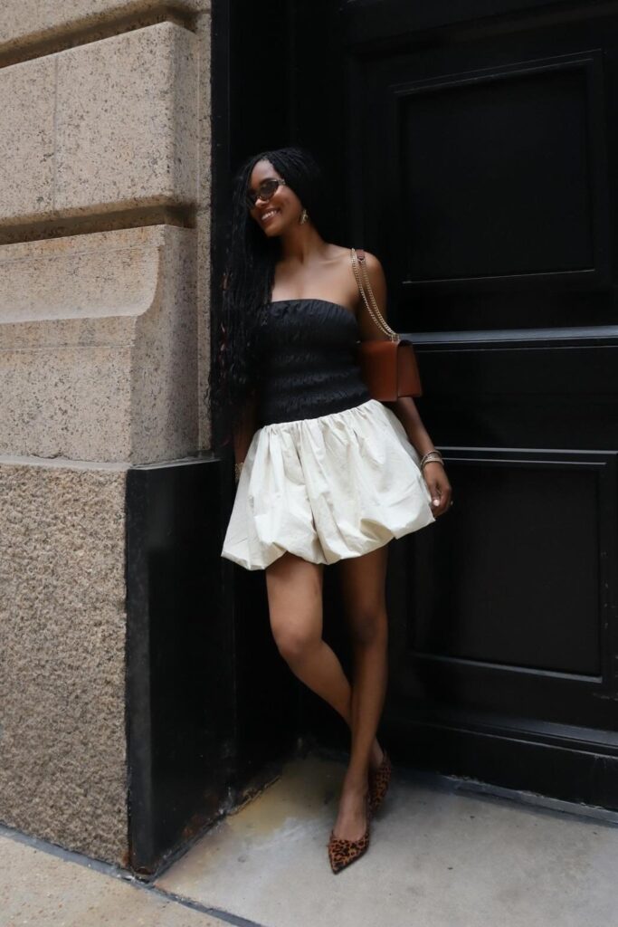 Black strapless top, white bubble mini skirt, and leopard print kitten heels