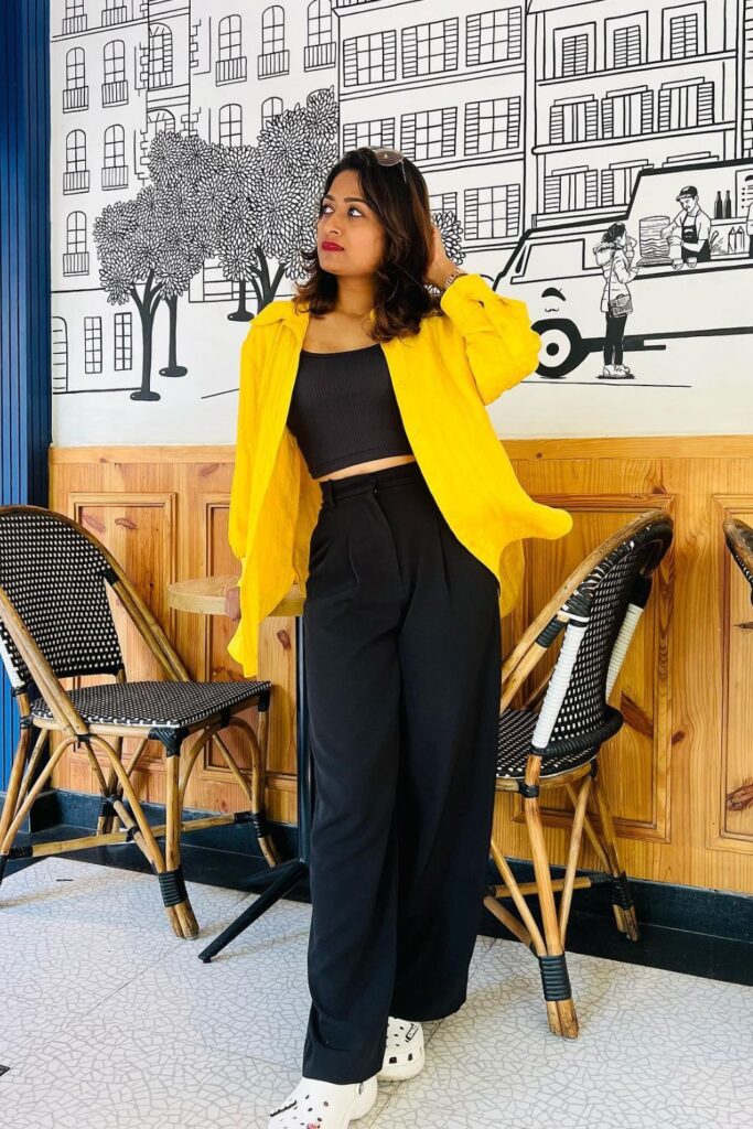 Bright Yellow Shirt Over Black Ensemble