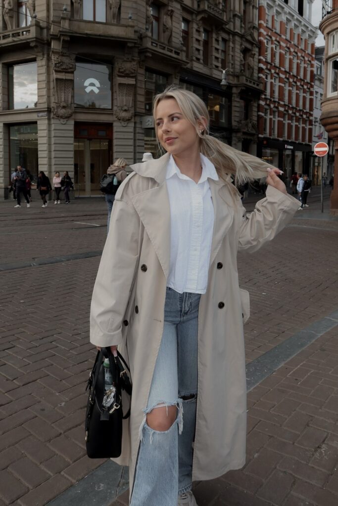 Beige Trench Coat and Ripped Jeans